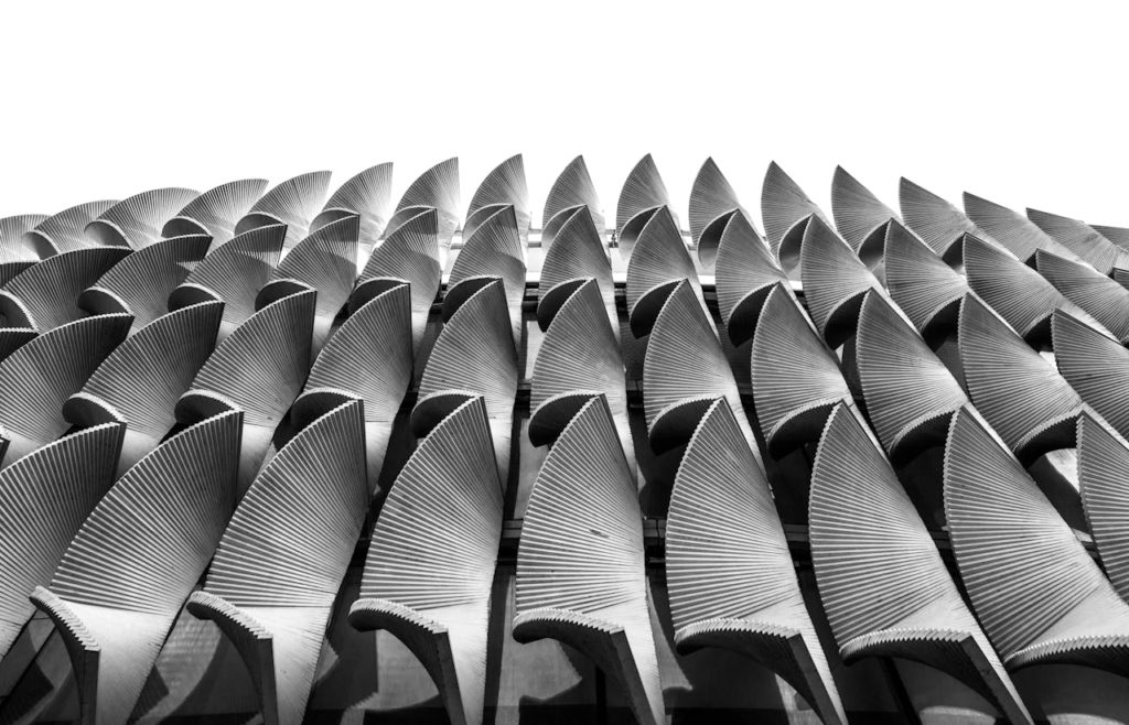 Black and white photo showcasing a modern architectural facade in Shiraz, Iran.